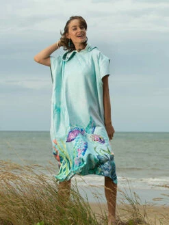 Ocean Armour Turtle Poncho -Online Dive Gear Sales Shop Ocean Armour Turtle Poncho Female Smiling Standing