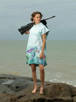 Ocean Armour Turtle Poncho -Online Dive Gear Sales Shop Ocean Armour Turtle Poncho Female Smiling Standing with Fins